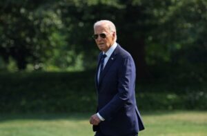 U.S. President Joe Biden walks across the South Lawn to board Marine One for travel to Nevada from the White House in Washington, U.S., July 15, 2024. REUTERS/Leah Millis
